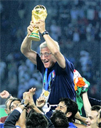 PRIDE AND JOY ... Italy coach Marcello Lippi and the Trophy... Italy coach Marcello Lippi said winning the World Cup was the greatest moment of his life after their nail-biting penalty shoot-out victory over France. Italy football soccer team on the Top of the World