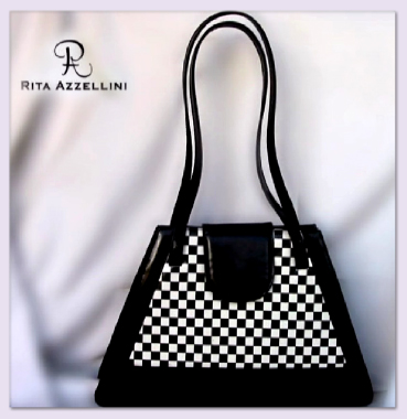 Luxury fashion handbags made in Italy to the worldwide Distribution, the soft leather skin used for internal and external of the handbags allows to Rita Azzellini offers you an exclusive collection of fine leather fashion handbags, vip chess collection very elegant, prestigious and high qualitative handbags, perfectly well-finished and exclusively hand-made by our experienced italian craftsmen to satisfy all our customers, also the most exacting and sophisticated people.