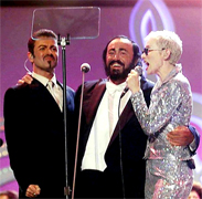 GEORGE MICHAEL, ANNIE LENNOX AND PAVAROTTI Luciano Pavarotti and his Friends, an organization created to help and support carity organizations around the world, a big concert every summer in Modena Italy with Brian May from Queen, Steve Wonder, George Michael, Zucchero, Laura Pausini, Lady Diana as special guest, The Spice girls, Andrea Bocelli, Bono from U2, Liza Minelli, and an incredible list of international guest coming to help childrens as Luciano's Friends
